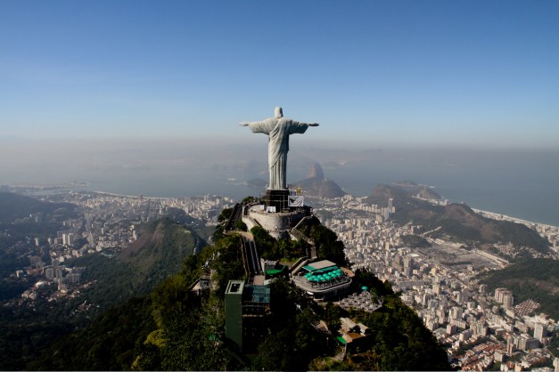 Christ the redeemer atop sugarloaf mountain is an easily recognizable sight of Rio de Janeiro
