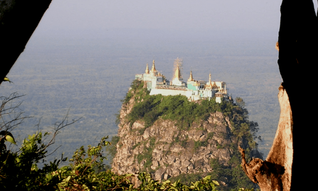Mount Popa sits perched atop its plateau