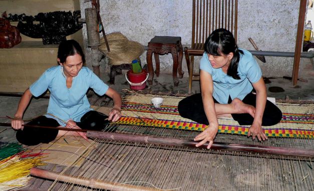 Silk Weavers plying their trade in Hoi An
